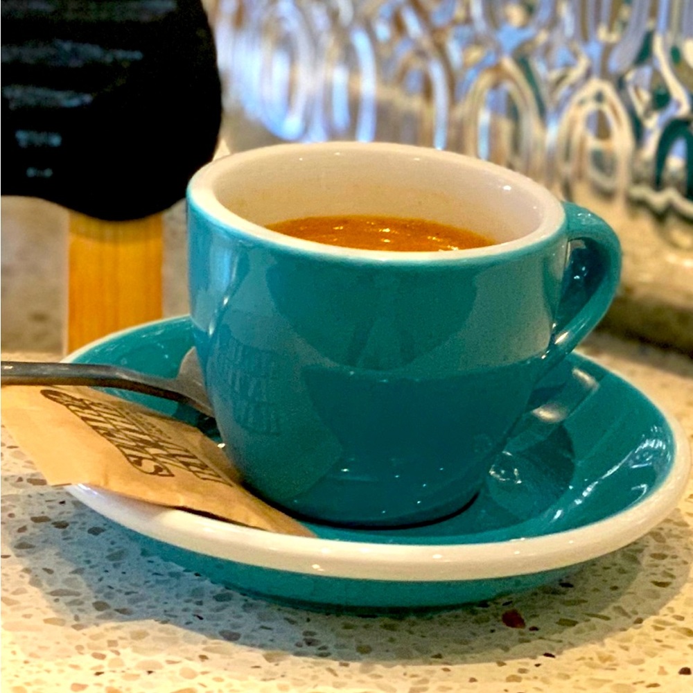 Set of 6 espresso cups and saucers.